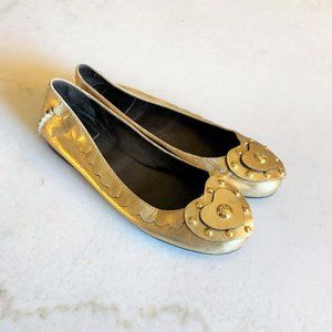 Like new! Tory Burch gold leather ballet flat shoes heart TB logo studs scallop
